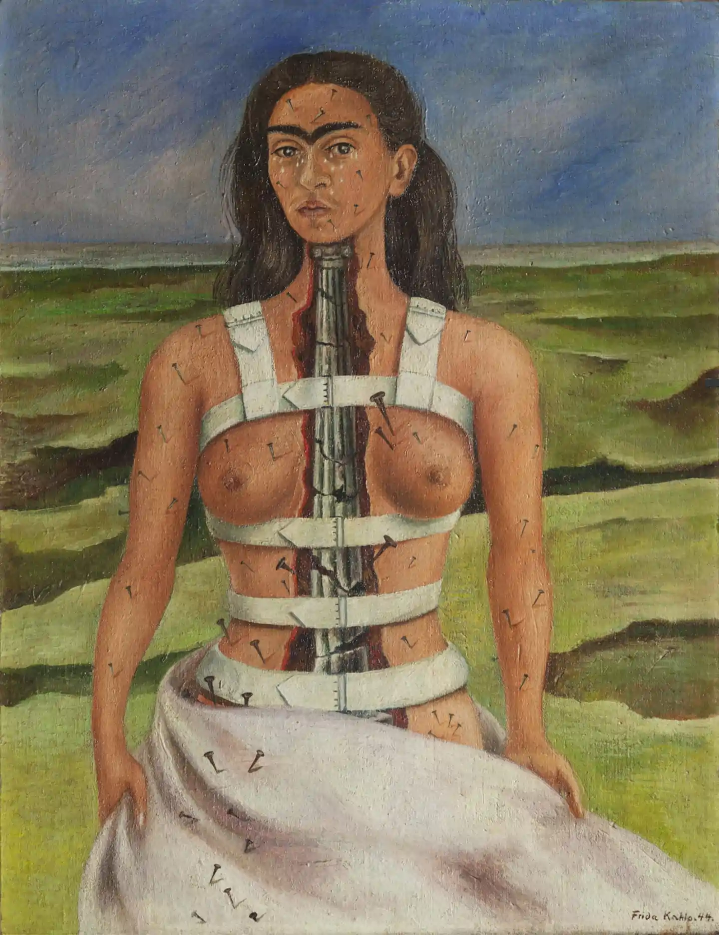 Il dipinto di Frida Kahlo "The Broken Column" raffigura il torso dell'artista aperto, rivelando una colonna frantumata all'interno, simbolo della sua sofferenza per il dolore fisico e le numerose operazioni subite dopo un incidente in autobus. Si trova in un paesaggio desolato, con lacrime che le scorrono sul viso, esprimendo l'angoscia emotiva e fisica che ha vissuto.